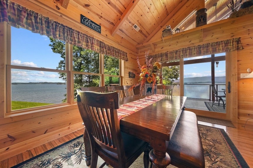 Warm dining area with lake view for a golf and explore getaway