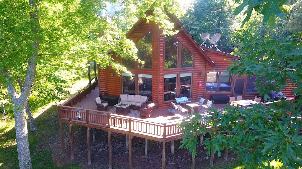 Warm lakeside cabin exterior for a family basecamp stay